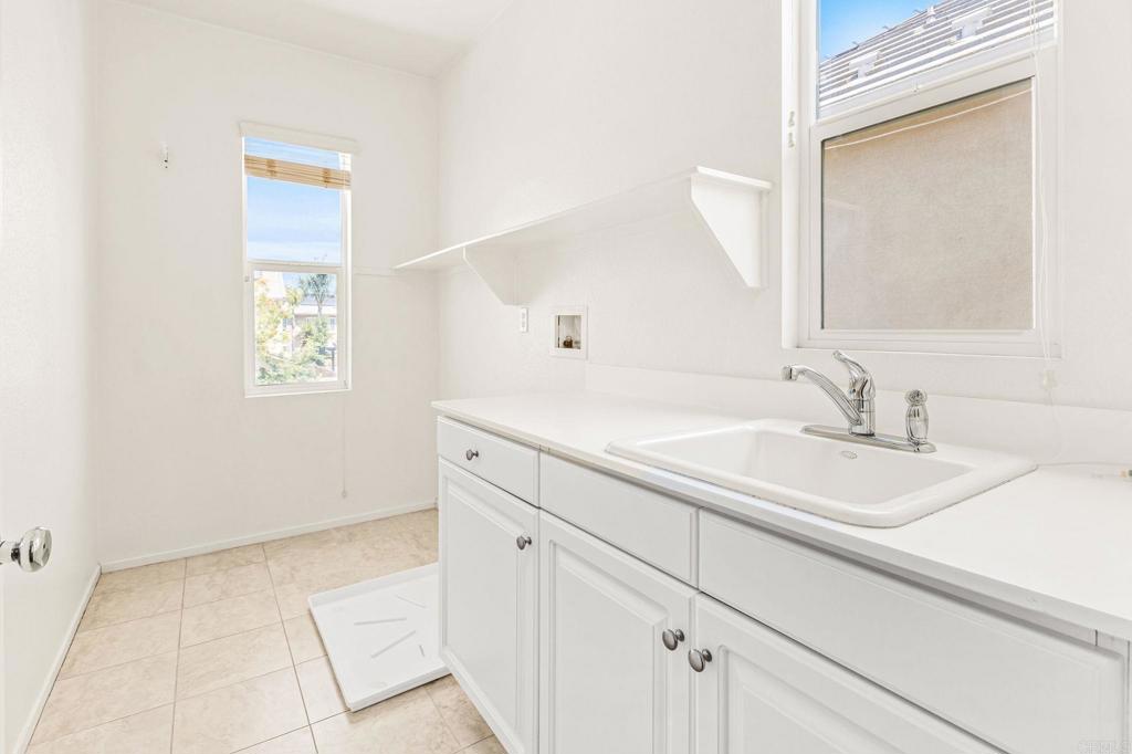 3848 Lake Park Street Fallbrook, CA 92028 - Photo 19 of 35 a bathroom with a sink and a mirror