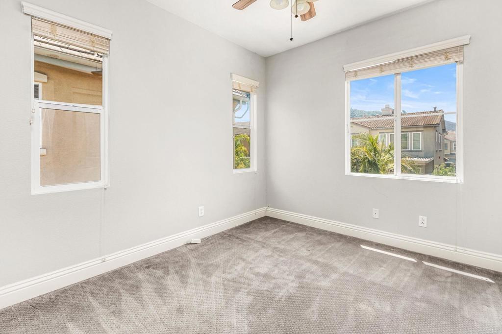 3848 Lake Park Street Fallbrook, CA 92028 - Photo 21 of 35 a view of an empty room with a window