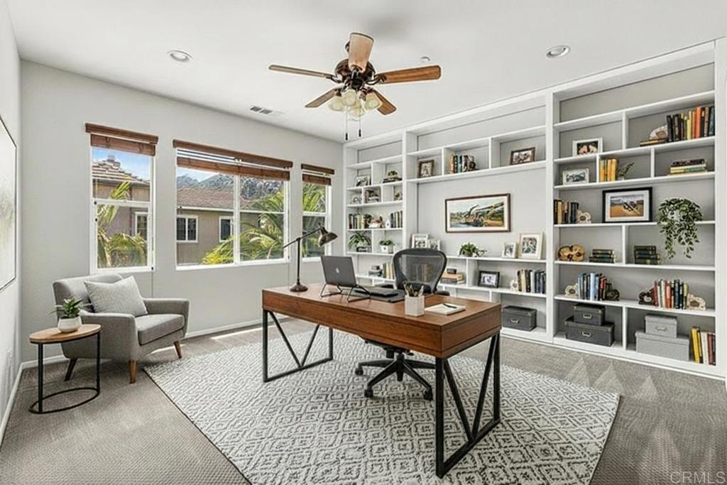 3848 Lake Park Street Fallbrook, CA 92028 - Photo 23 of 35 a workspace with furniture window and a chandelier