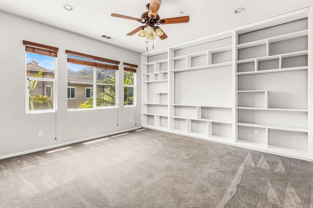 3848 Lake Park Street Fallbrook, CA 92028 - Photo 24 of 35 a view of an empty room with a window
