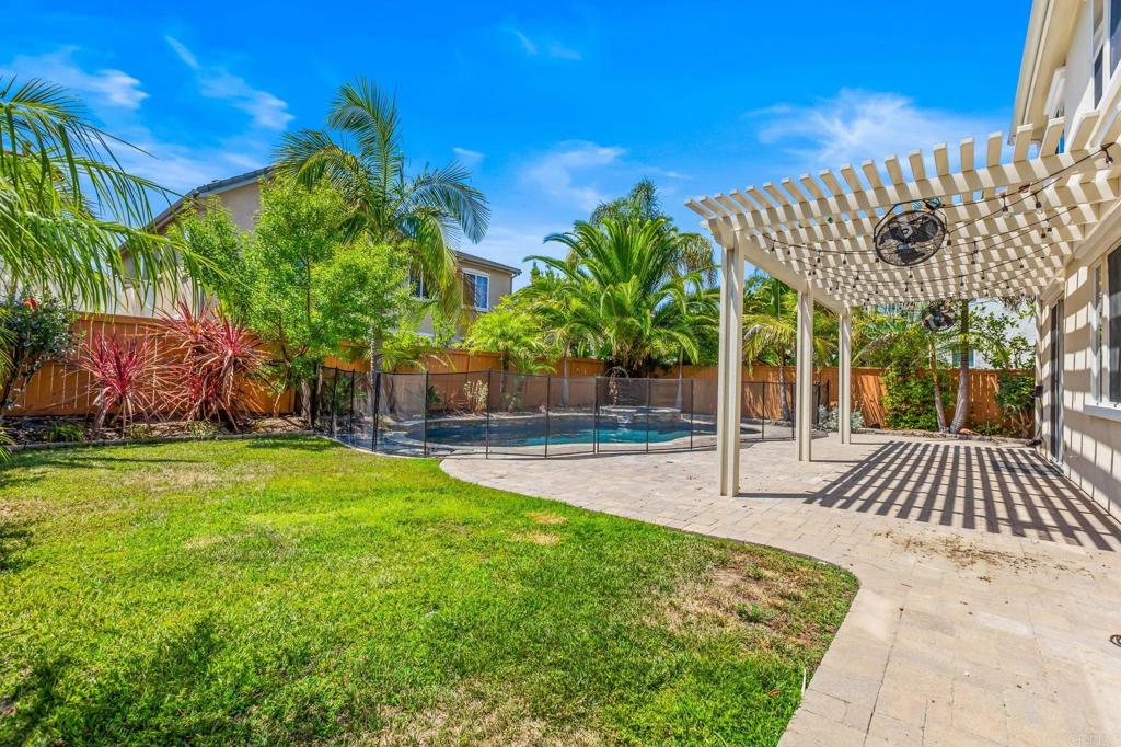 3848 Lake Park Street Fallbrook, CA 92028 - Photo 32 of 35 a view of a backyard with a garden