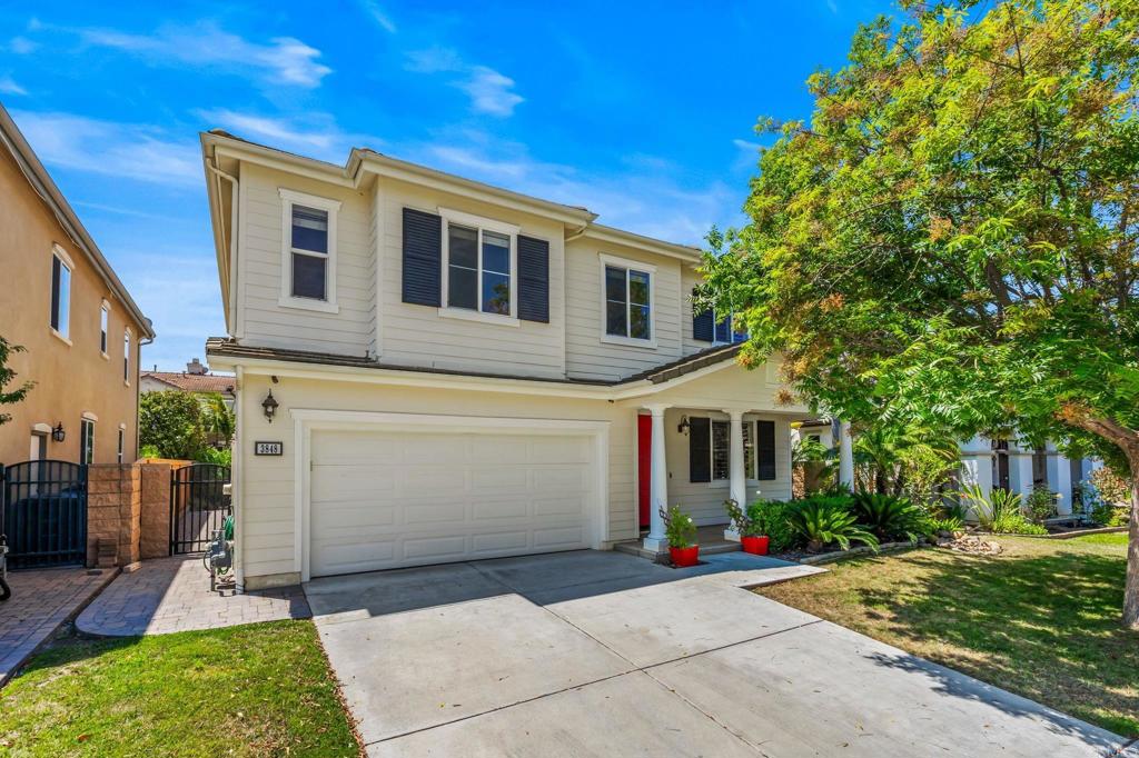 3848 Lake Park Street Fallbrook, CA 92028 - Photo 33 of 35 a front view of a house with a yard and garage