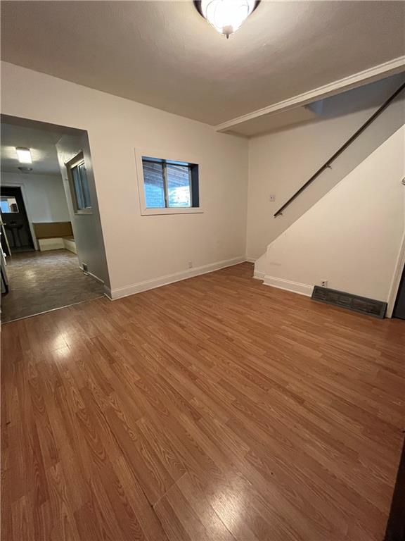 67 Barry Street Pittsburgh, PA 15203 - Photo 3 of 17 a view of a livingroom with wooden floor
