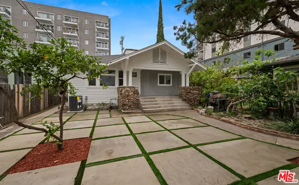a house with view of a garden