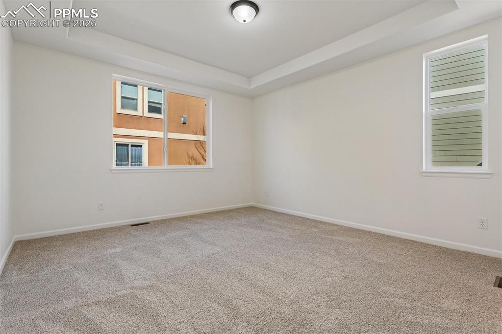 960 Fire Rock Place Colorado Springs, CO 80921 - Photo 11 of 30 an empty room with a window