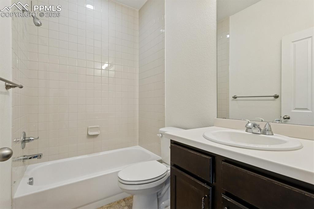 960 Fire Rock Place Colorado Springs, CO 80921 - Photo 19 of 30 a bathroom with a sink a toilet and a bathtub