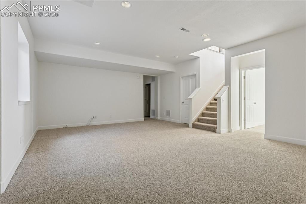 960 Fire Rock Place Colorado Springs, CO 80921 - Photo 21 of 30 a view of an empty room with stairs