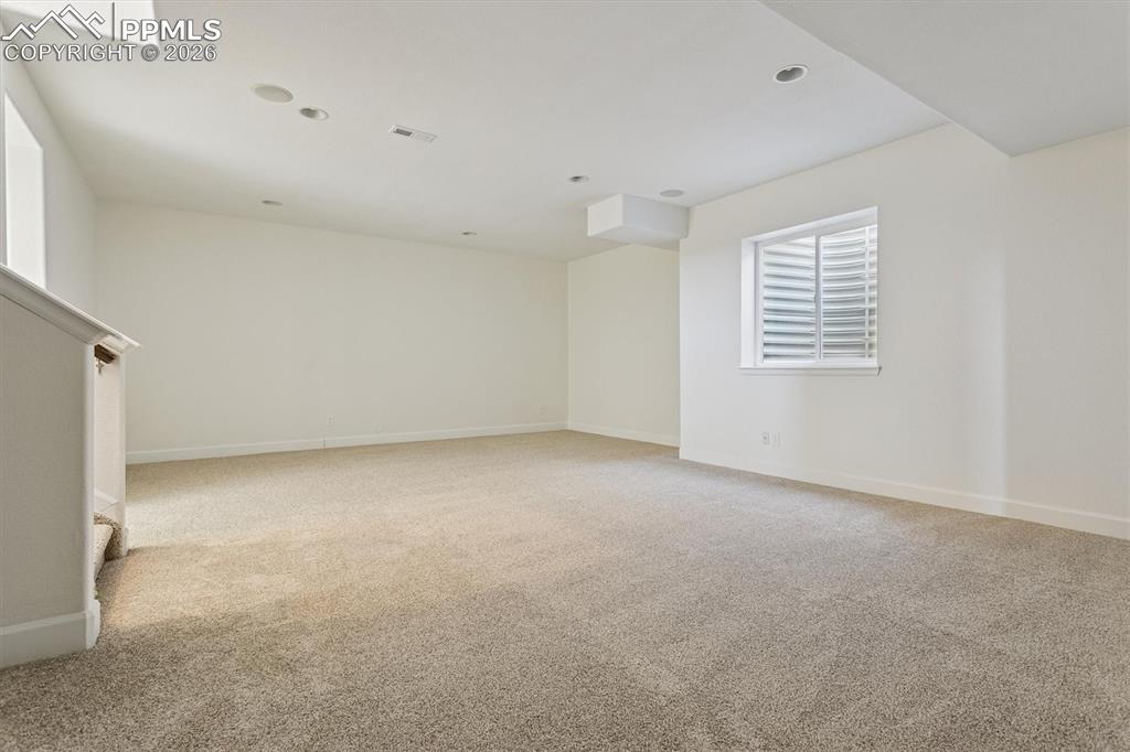 960 Fire Rock Place Colorado Springs, CO 80921 - Photo 22 of 30 an empty room with windows