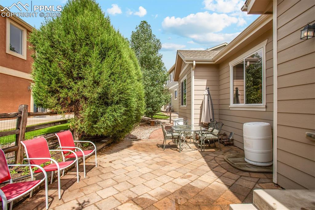 960 Fire Rock Place Colorado Springs, CO 80921 - Photo 29 of 30 a backyard of a house with outdoor seating