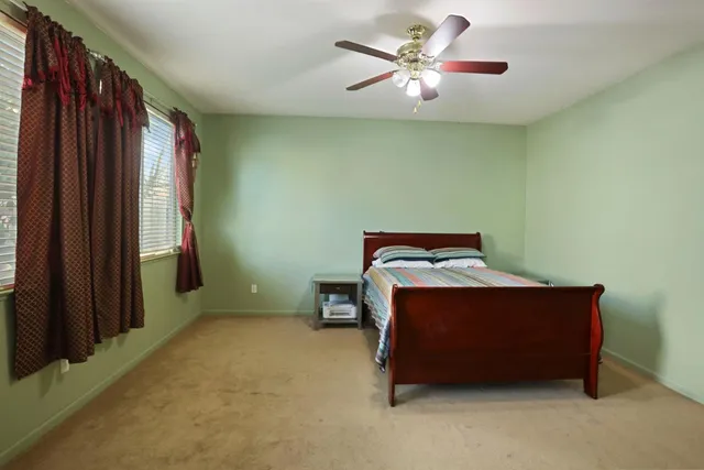 a room with furniture and a window