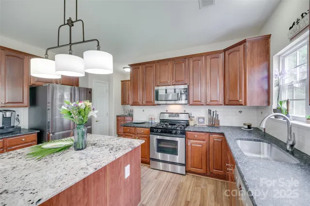 a view of storage and utility room with a washer dryer