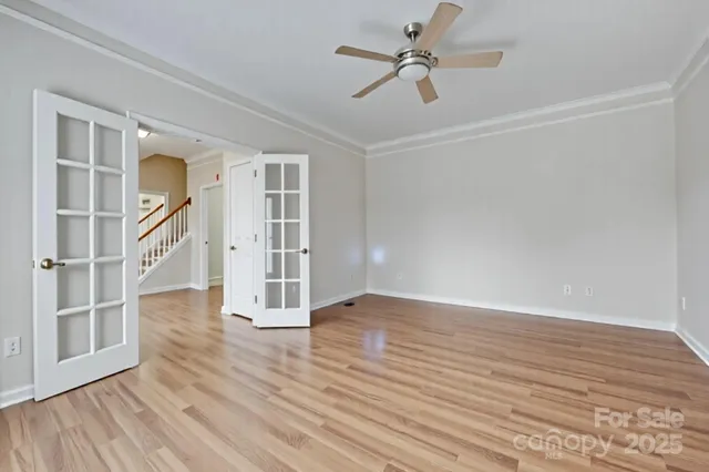 a view of a dining room with furniture and window