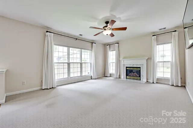 a kitchen with a dining table chairs stove and kitchen view