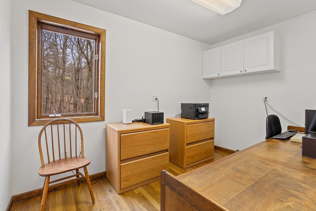 88 Coventry Wood Road Bolton, MA 01740 - Photo 19 of 41 a room with furniture and a window