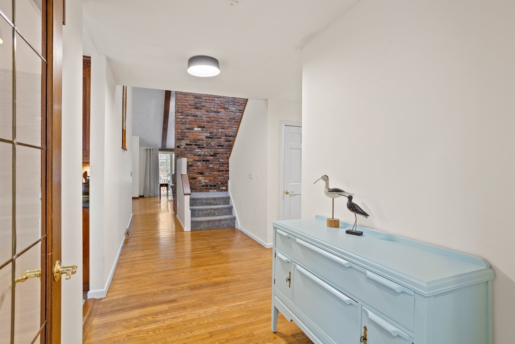 88 Coventry Wood Road Bolton, MA 01740 - Photo 2 of 41 a bathroom with a sink and mirror