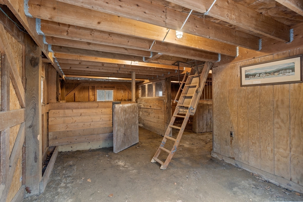 88 Coventry Wood Road Bolton, MA 01740 - Photo 38 of 41 a view of a room with racks