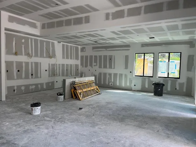 a view of a building with a glass door