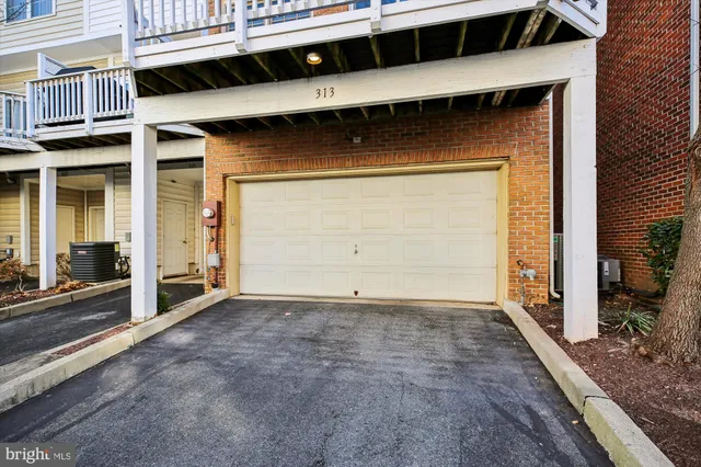 a living room with furniture a table and a large window