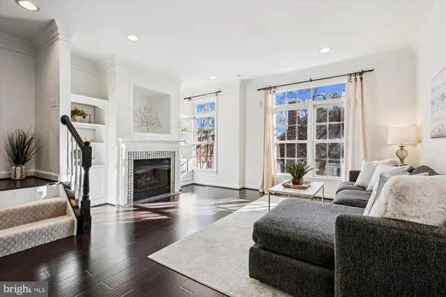 a view of a dining room with furniture and window