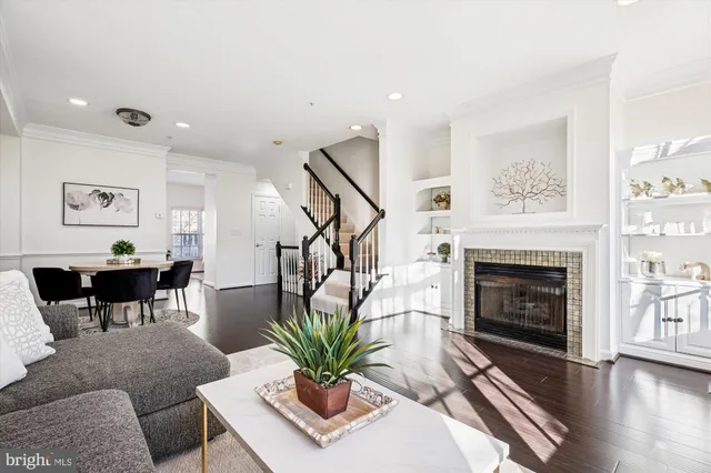 a kitchen with stainless steel appliances granite countertop a refrigerator sink and cabinets