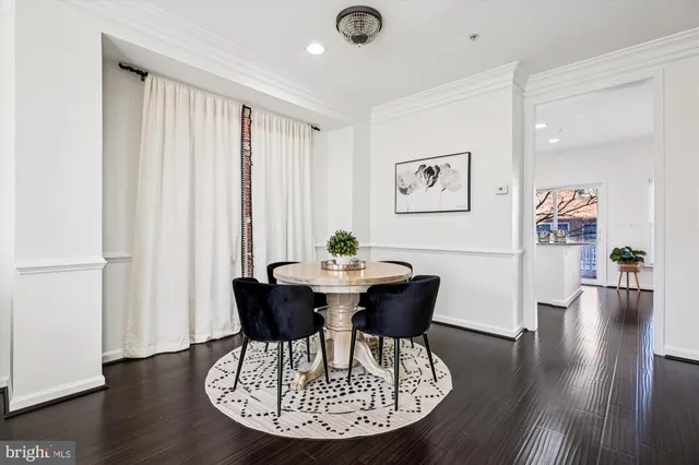 a kitchen with granite countertop a sink and cabinets