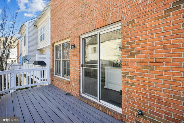a bedroom with furniture and a fireplace