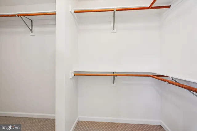 a picture of a room with a white wall and a white wall