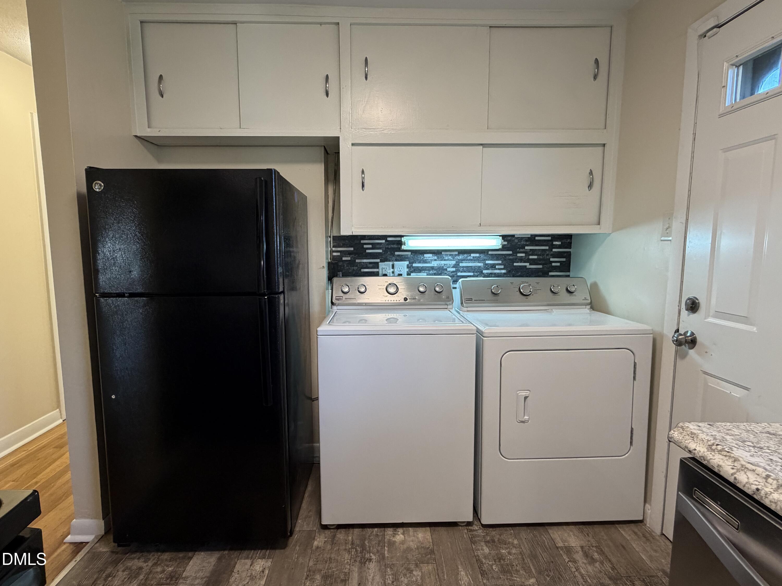 503 Spring Avenue Spring Lake, NC 28390 - Photo 15 of 36 a utility room with dryer and washer