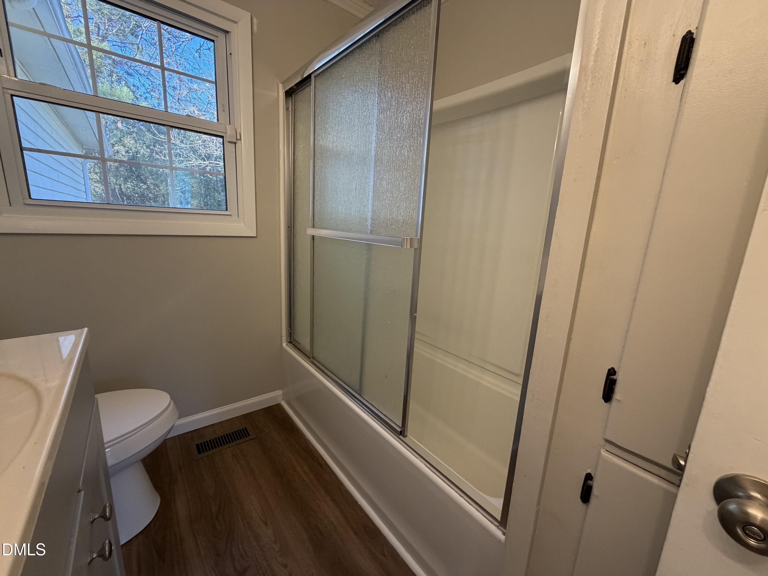 503 Spring Avenue Spring Lake, NC 28390 - Photo 21 of 36 a bathroom with a toilet and a shower
