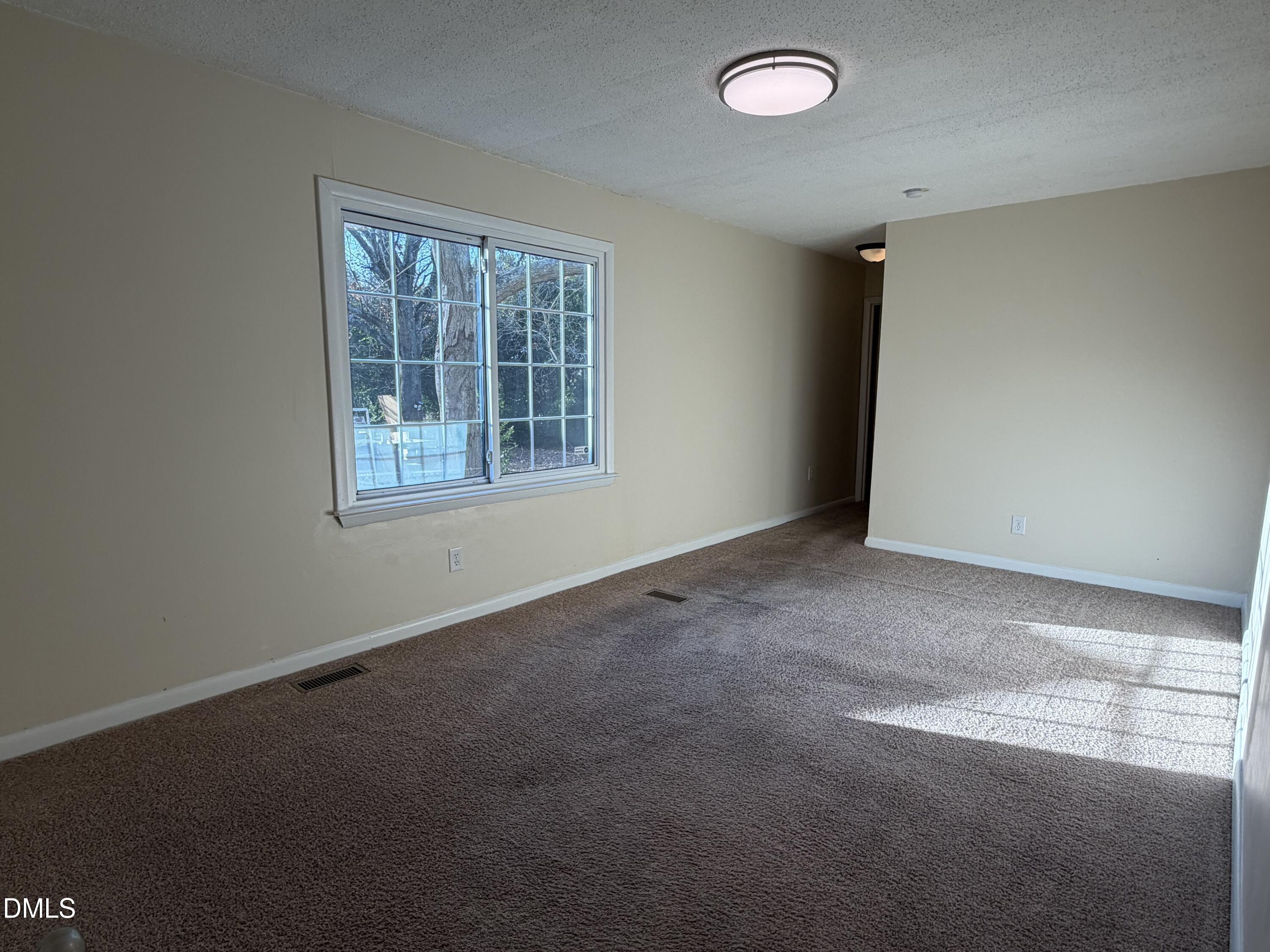 503 Spring Avenue Spring Lake, NC 28390 - Photo 24 of 36 an empty room with a window