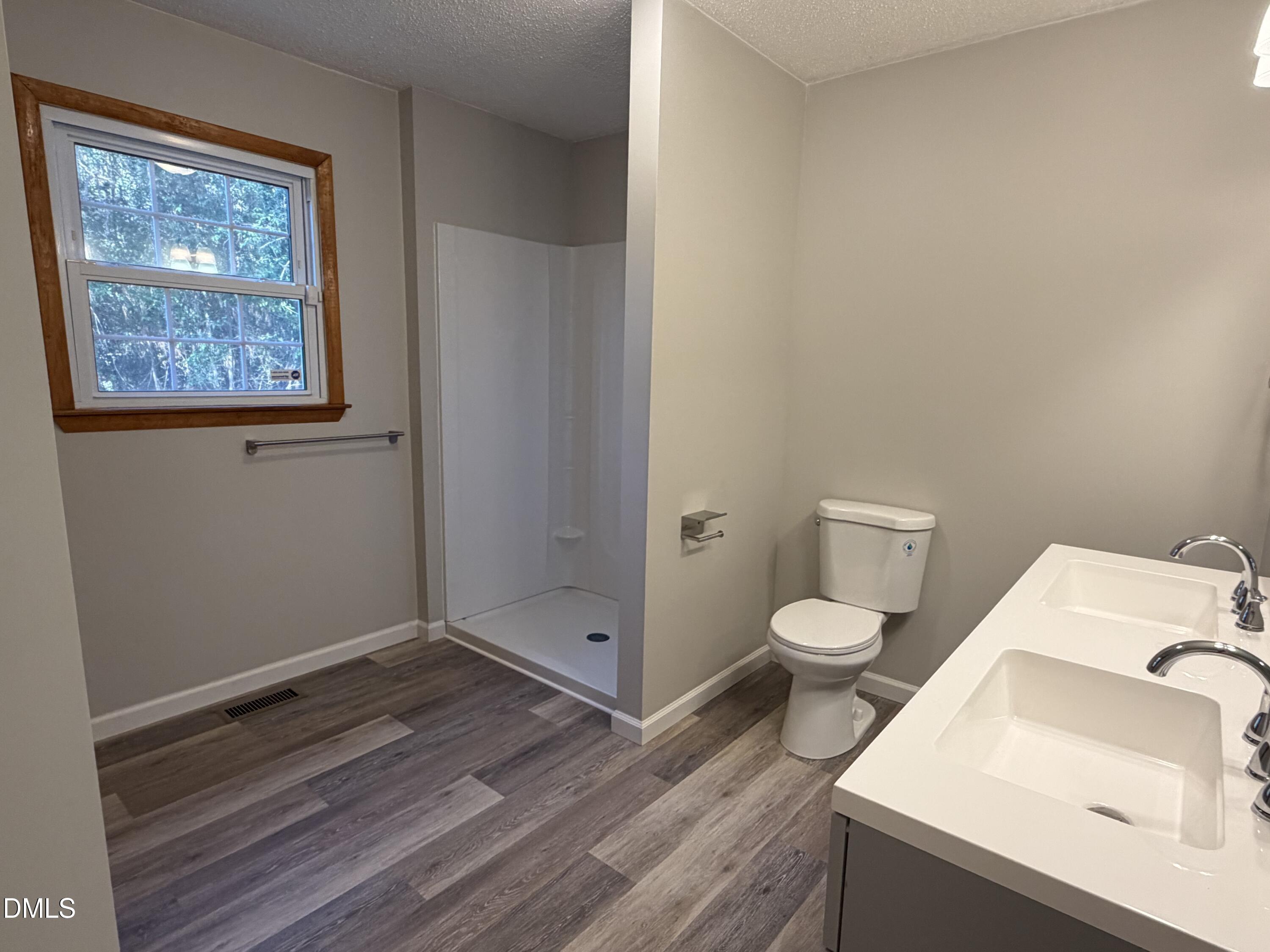 503 Spring Avenue Spring Lake, NC 28390 - Photo 27 of 36 a bathroom with a toilet and a sink