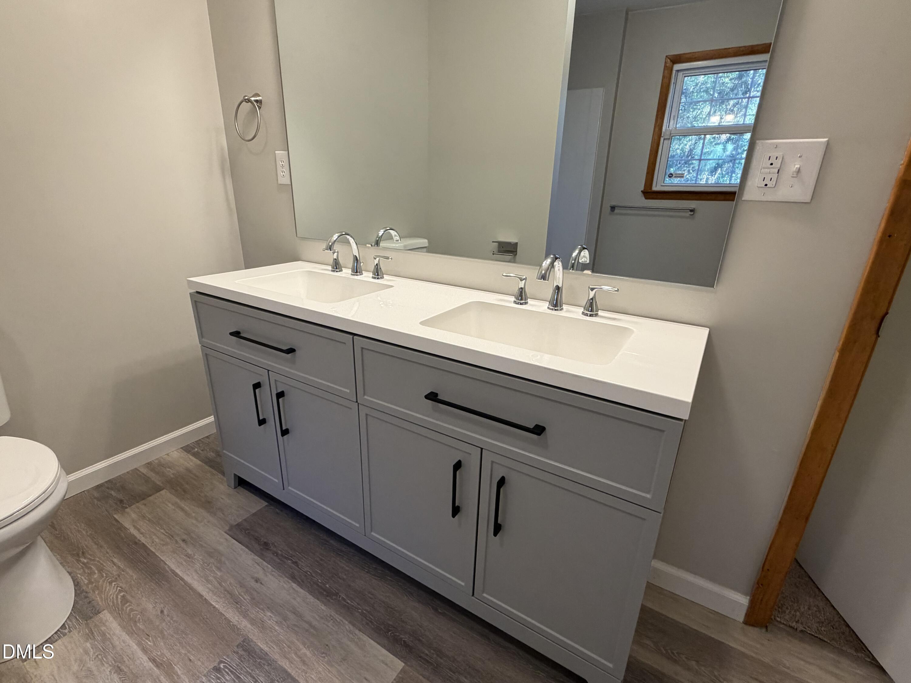 503 Spring Avenue Spring Lake, NC 28390 - Photo 29 of 36 a bathroom with a sink and a toilet