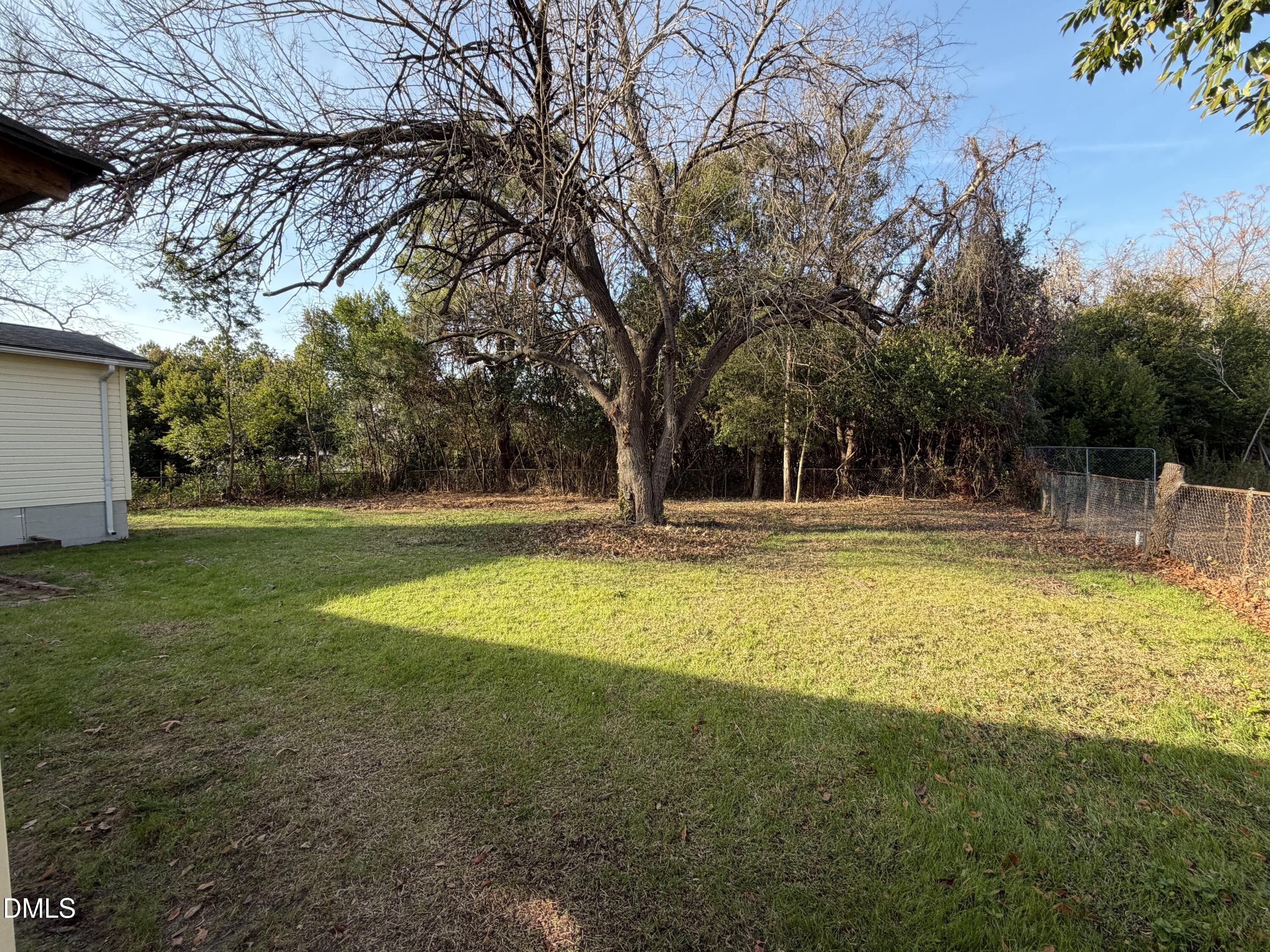 503 Spring Avenue Spring Lake, NC 28390 - Photo 30 of 36 a swimming pool with outdoor seating and yard