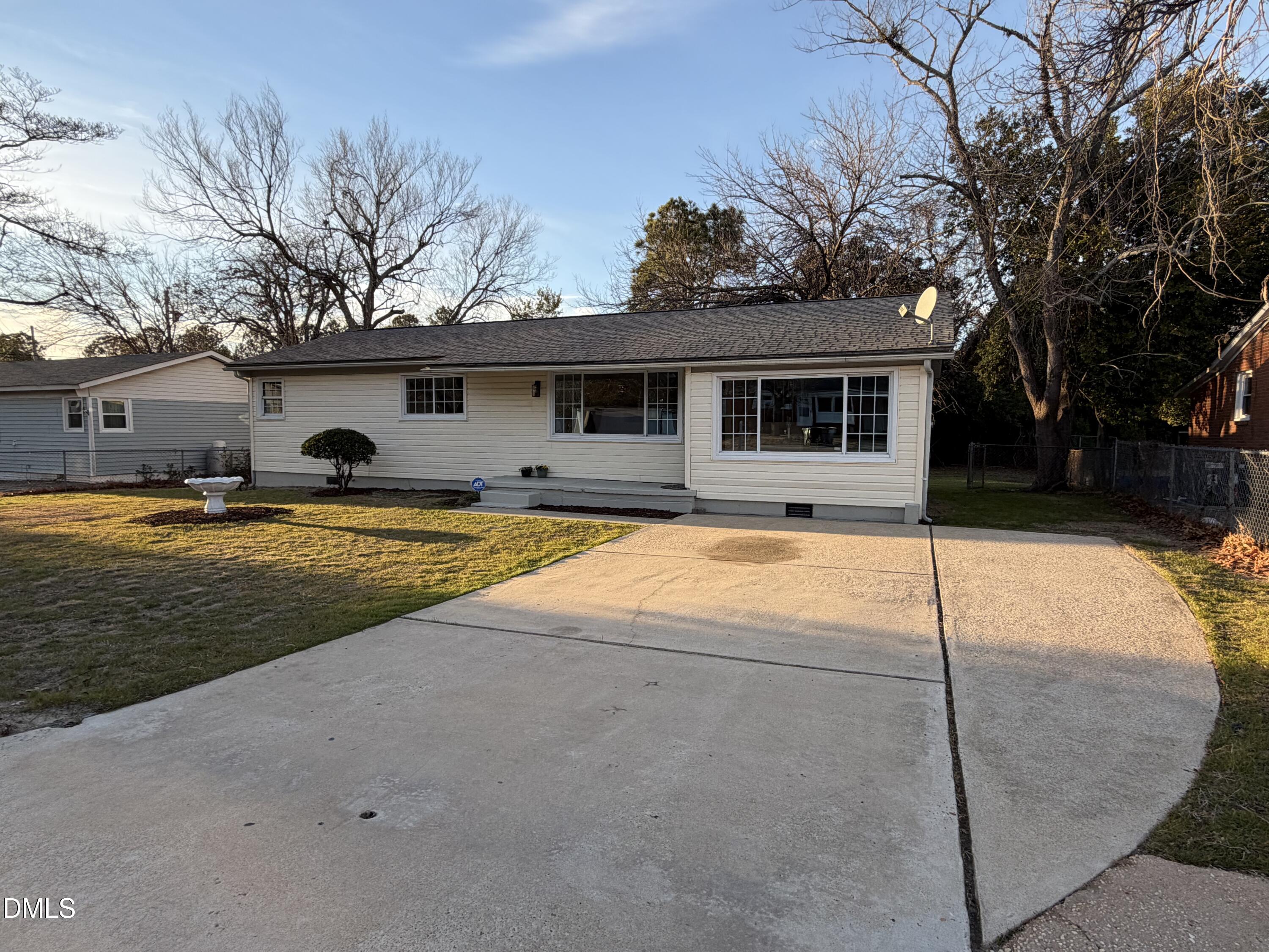 503 Spring Avenue Spring Lake, NC 28390 - Photo 34 of 36 a view of a house with swimming pool