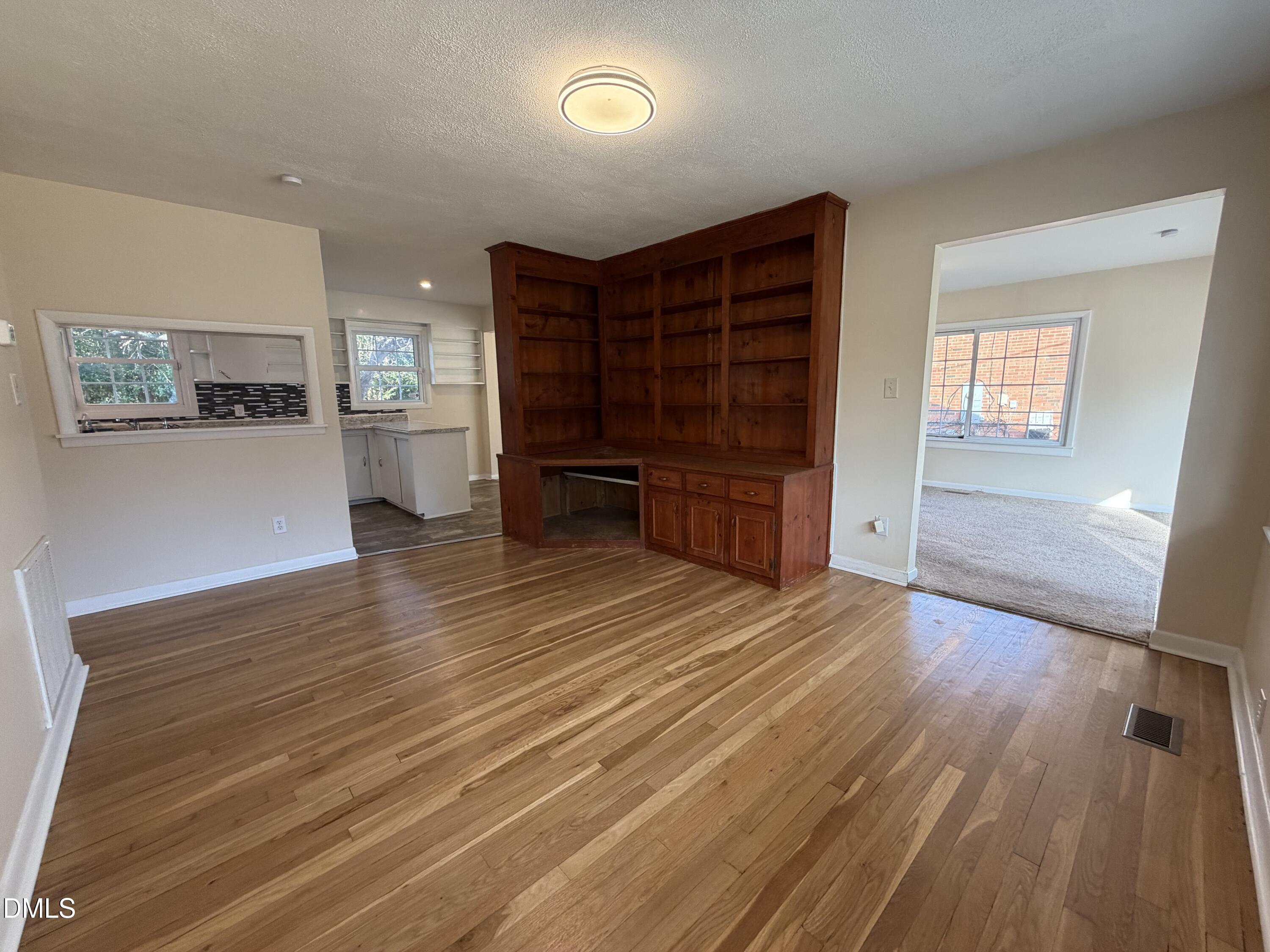 503 Spring Avenue Spring Lake, NC 28390 - Photo 8 of 36 a room with furniture and wooden floor
