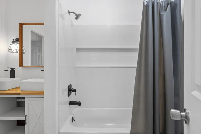 a bathroom with a bathtub