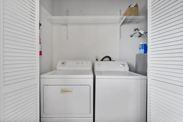 a utility room with dryer and washer