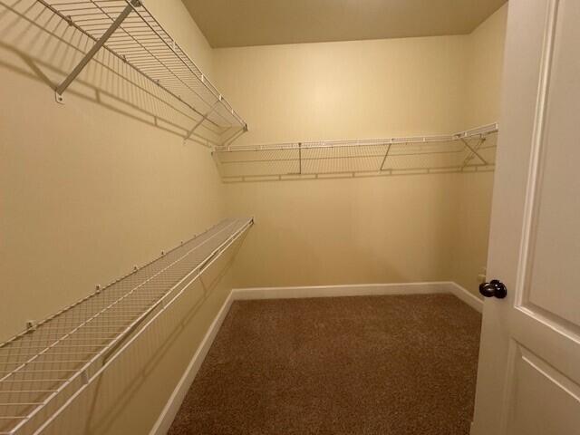 6441 Borasco Drive, Unit 2404 Melbourne, FL 32940 - Photo 9 of 28 a view of a room with racks on the wall