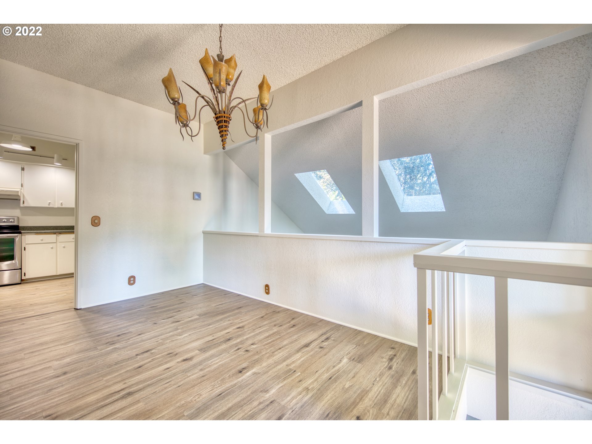 37821 Shenandoah Loop Springfield, OR 97478 - Photo 11 of 32 a view of empty room with wooden floor
