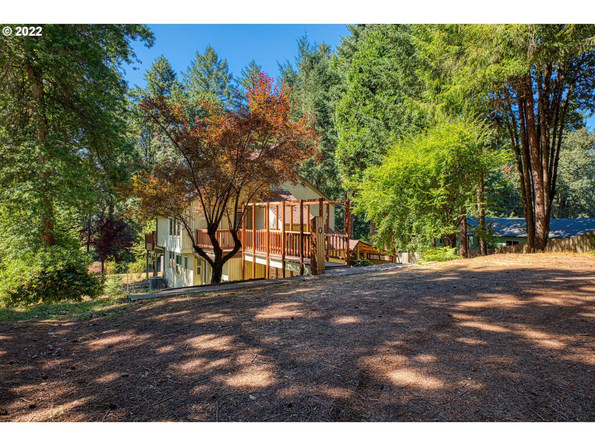 37821 Shenandoah Loop Springfield, OR 97478 - Photo 32 of 32 a view of a street with a building in the background
