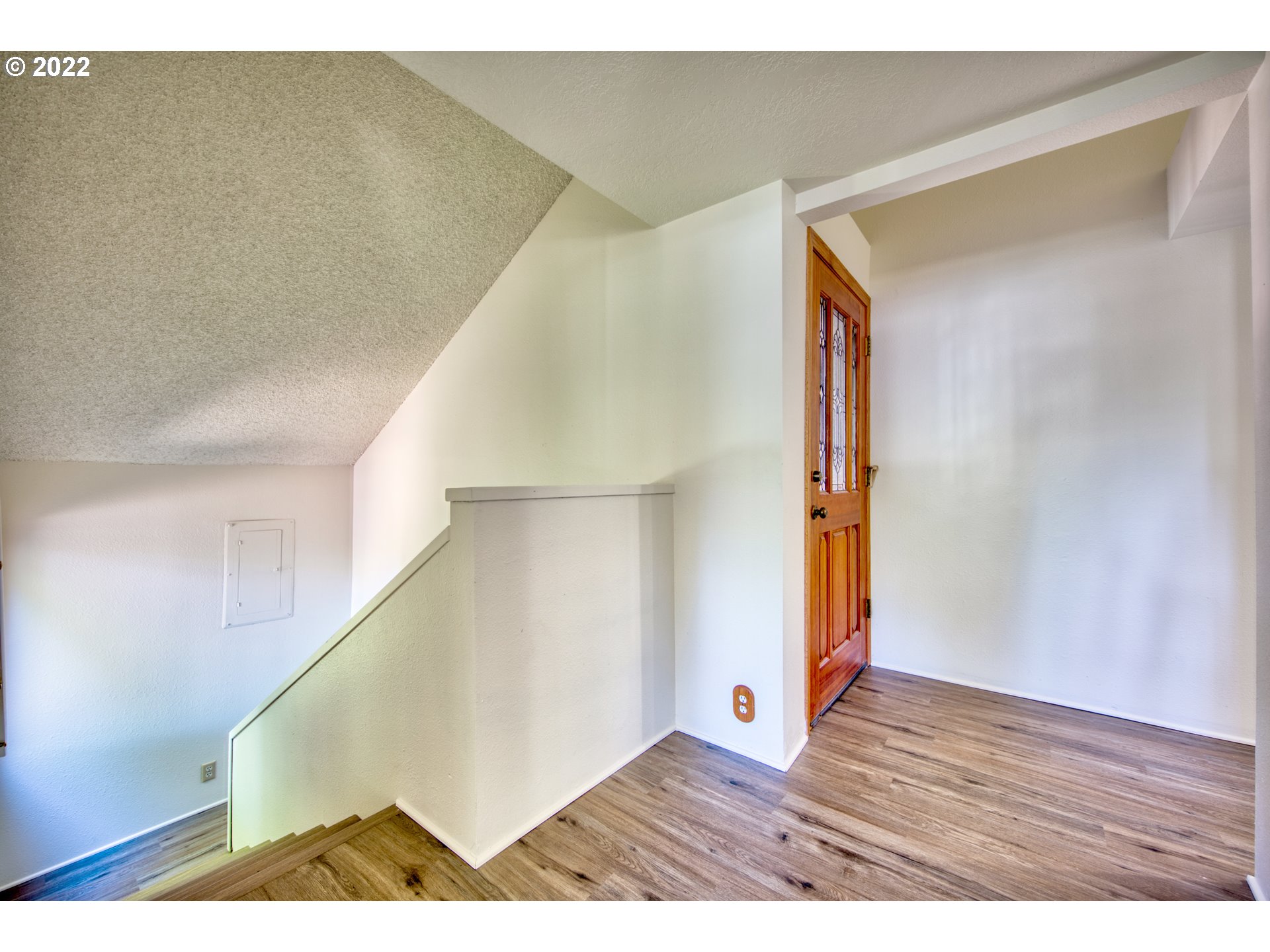 37821 Shenandoah Loop Springfield, OR 97478 - Photo 5 of 32 a view of an empty room with wooden floor