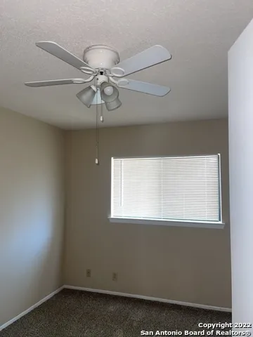 a close view of stove a microwave and stove