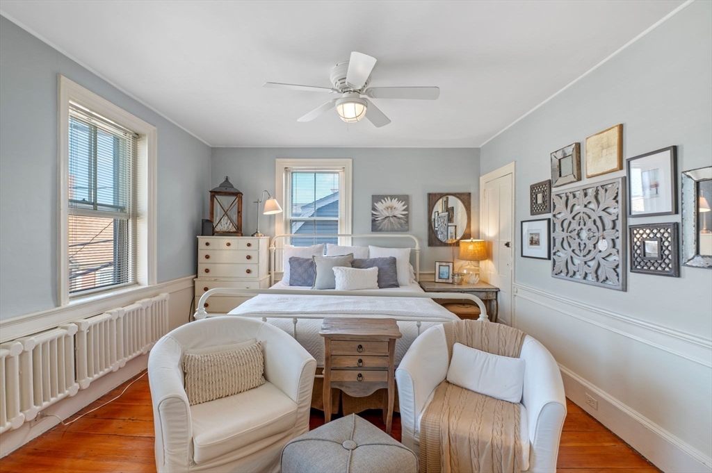 29 Front Street, Unit 2 Marblehead, MA 01945 - Photo 20 of 38 a living room with furniture and a large window