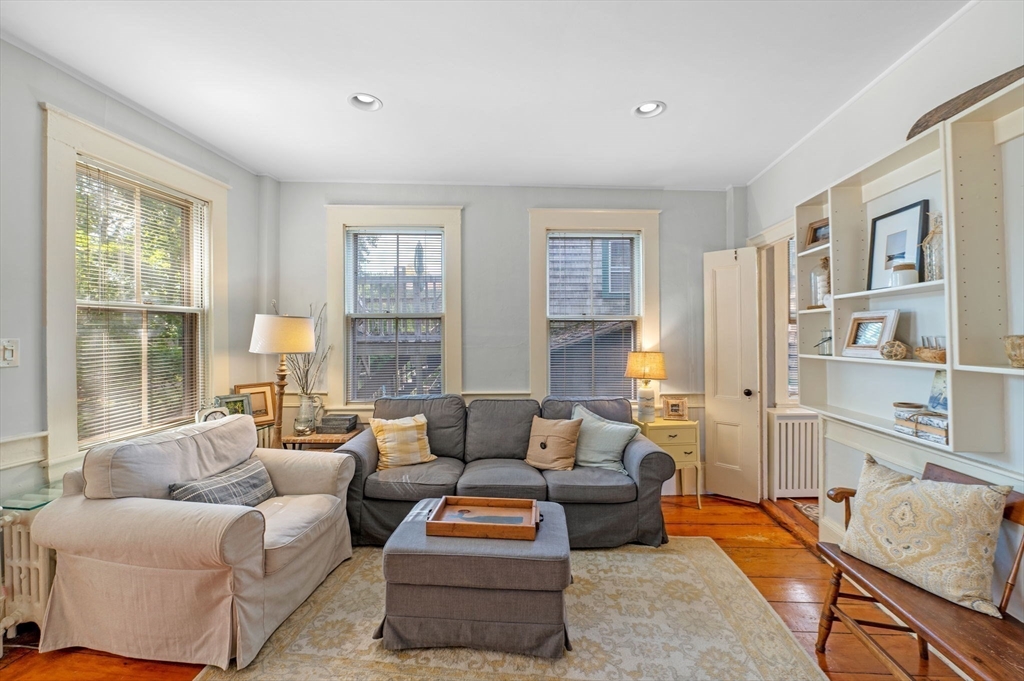 29 Front Street, Unit 2 Marblehead, MA 01945 - Photo 6 of 38 a living room with furniture and a large window
