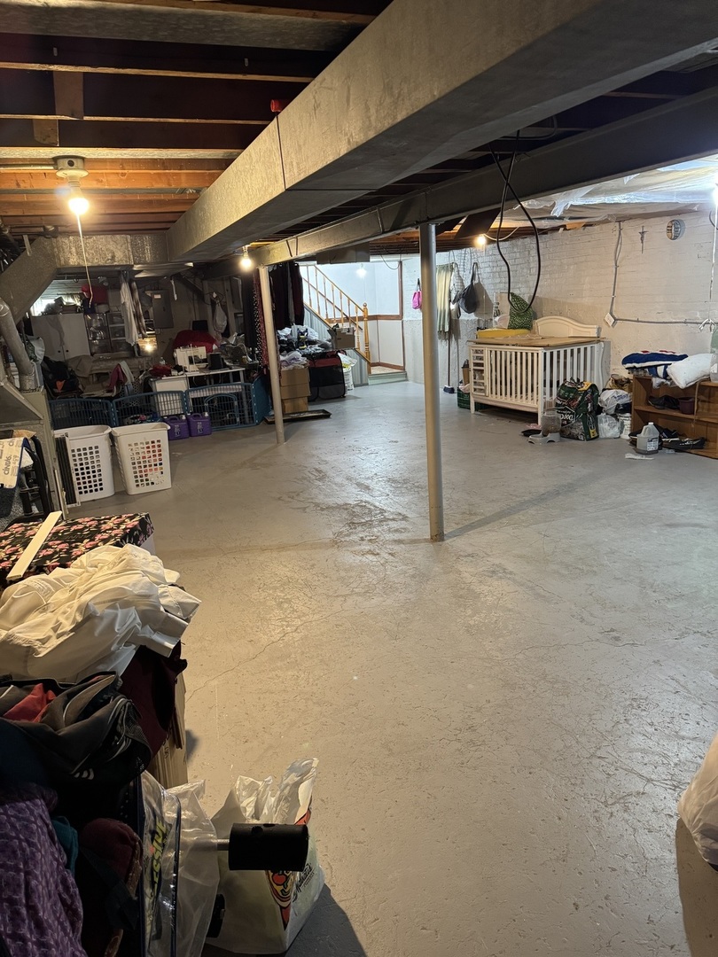 7836 Monitor Avenue Burbank, IL 60459 - Photo 11 of 26 a view of parking garage with cars