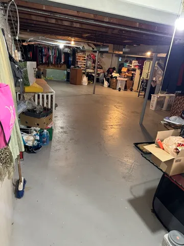 a room with furniture and gym equipment