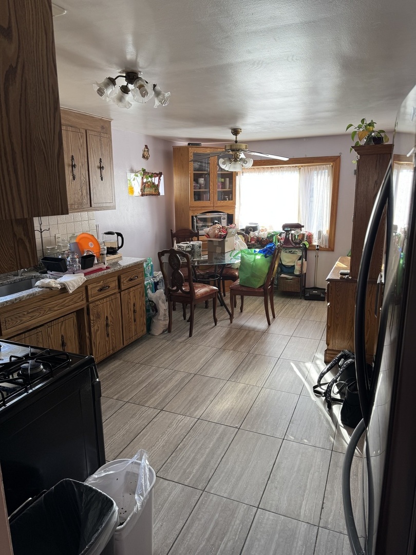 7836 Monitor Avenue Burbank, IL 60459 - Photo 19 of 26 a room with furniture or air conditioner and window