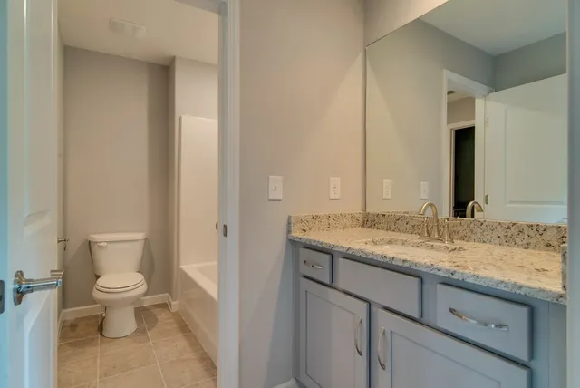 a room with gym equipment and a window