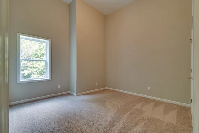 an aerial view of a city with lake view