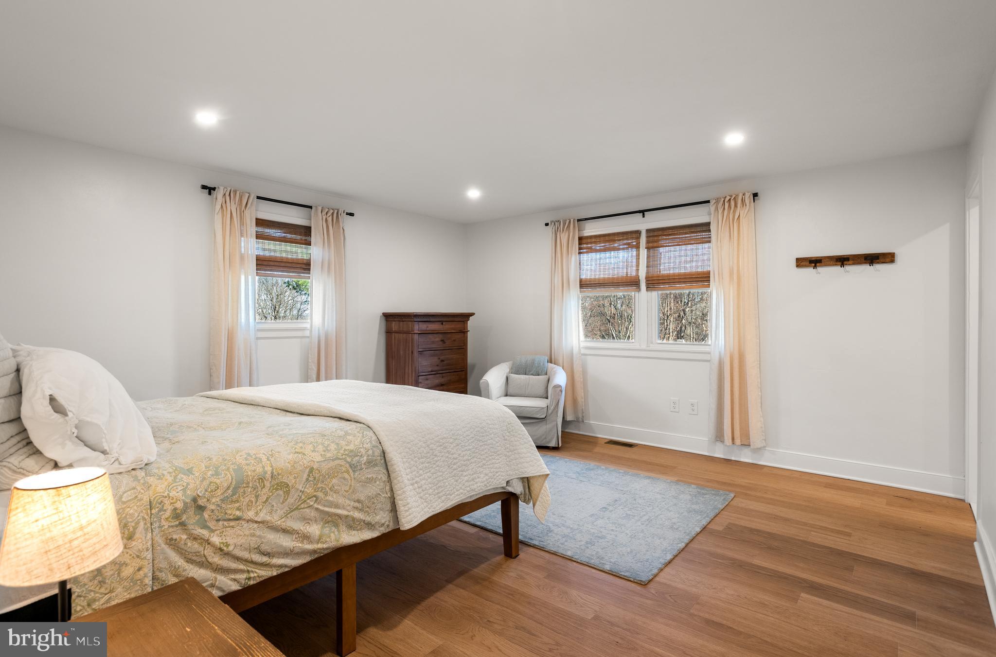 723 Saylors Mill Road Spring City, PA 19475 - Photo 30 of 74 a bedroom with a bed and wooden floor